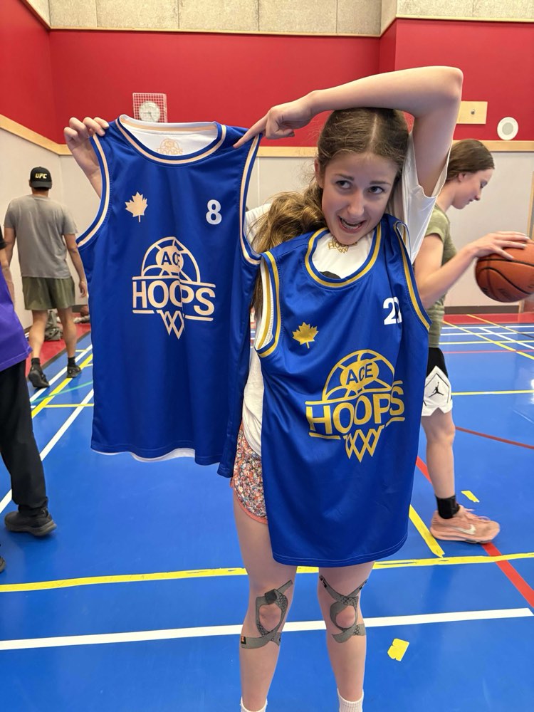 Player showing off the ACE Hoops jerseys