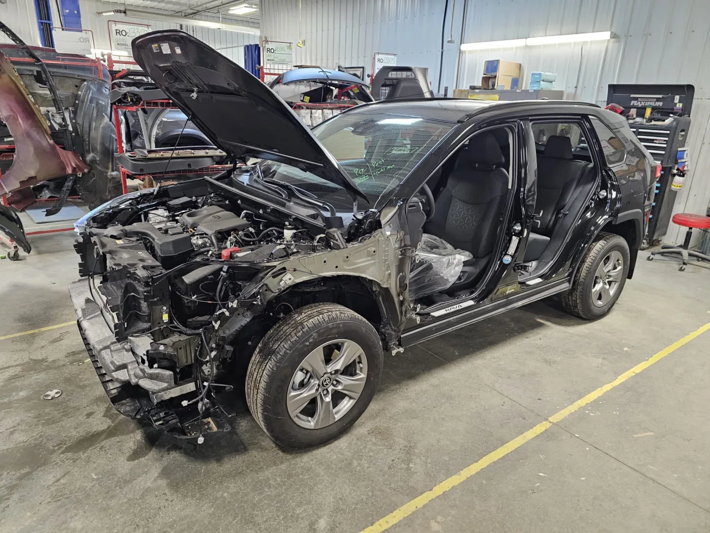 A vehicle mid-repair in the CSN Frank's collision bay in Vernon, BC