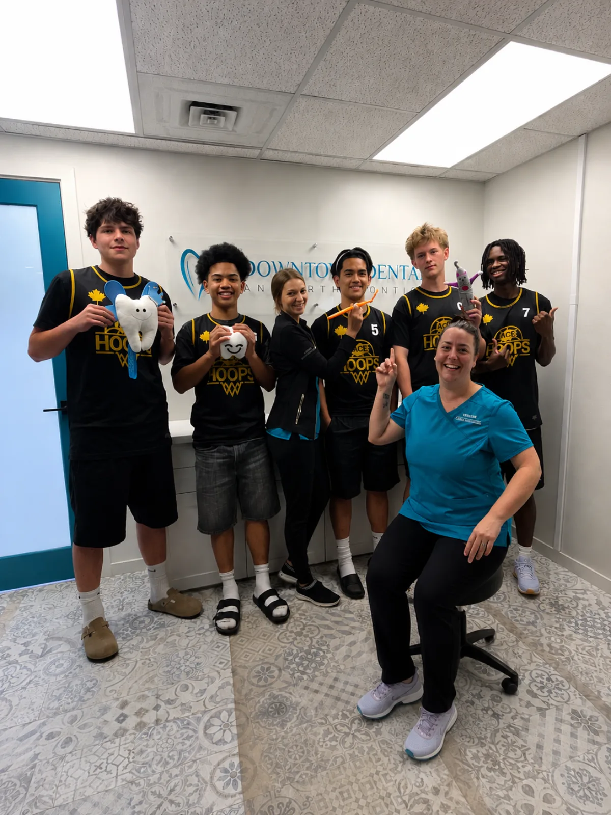 ACE Hoops U16 Boys with the Downtown Dental & Orthodontics team in Vernon